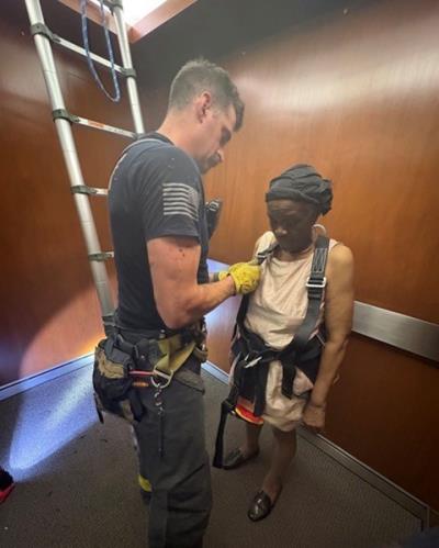 Firefighter_with_blind_lady_edited.jpg